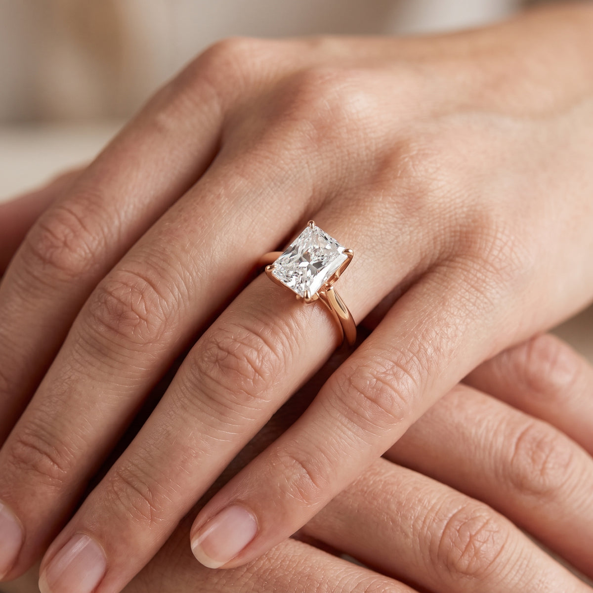 Evie Solitaire Six-Prong Radiant Diamond Engagement Ring in Rose Gold - lifestyle.jpg