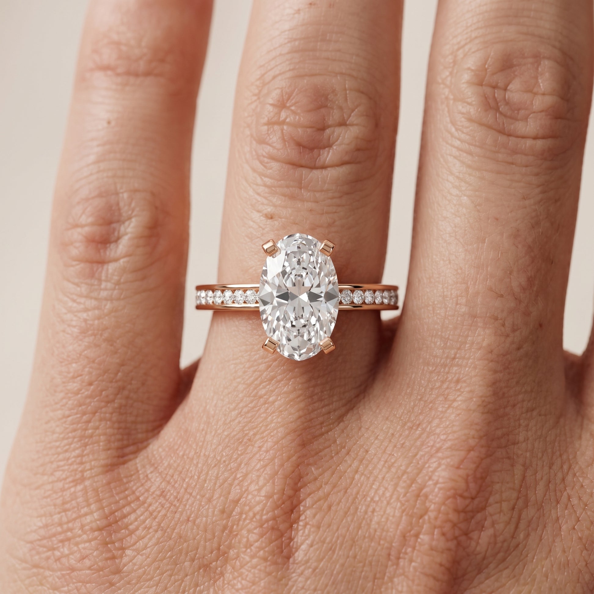 Tessa Solitaire Channel Set Oval Diamond Engagement Ring in Rose Gold - lifestyle.jpg