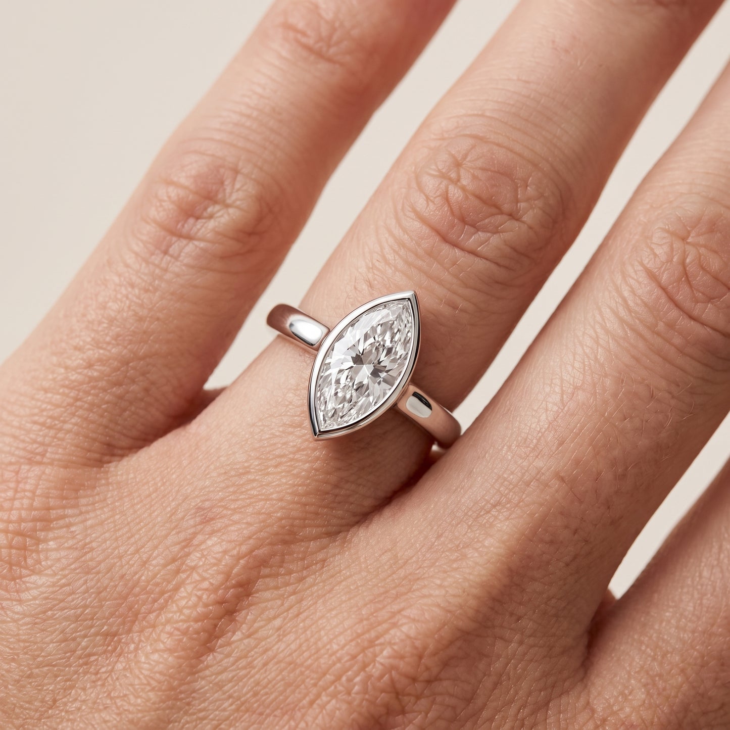 Jolie Bezel Solitaire Marquise Diamond Engagement Ring in White Gold - lifestyle.jpg