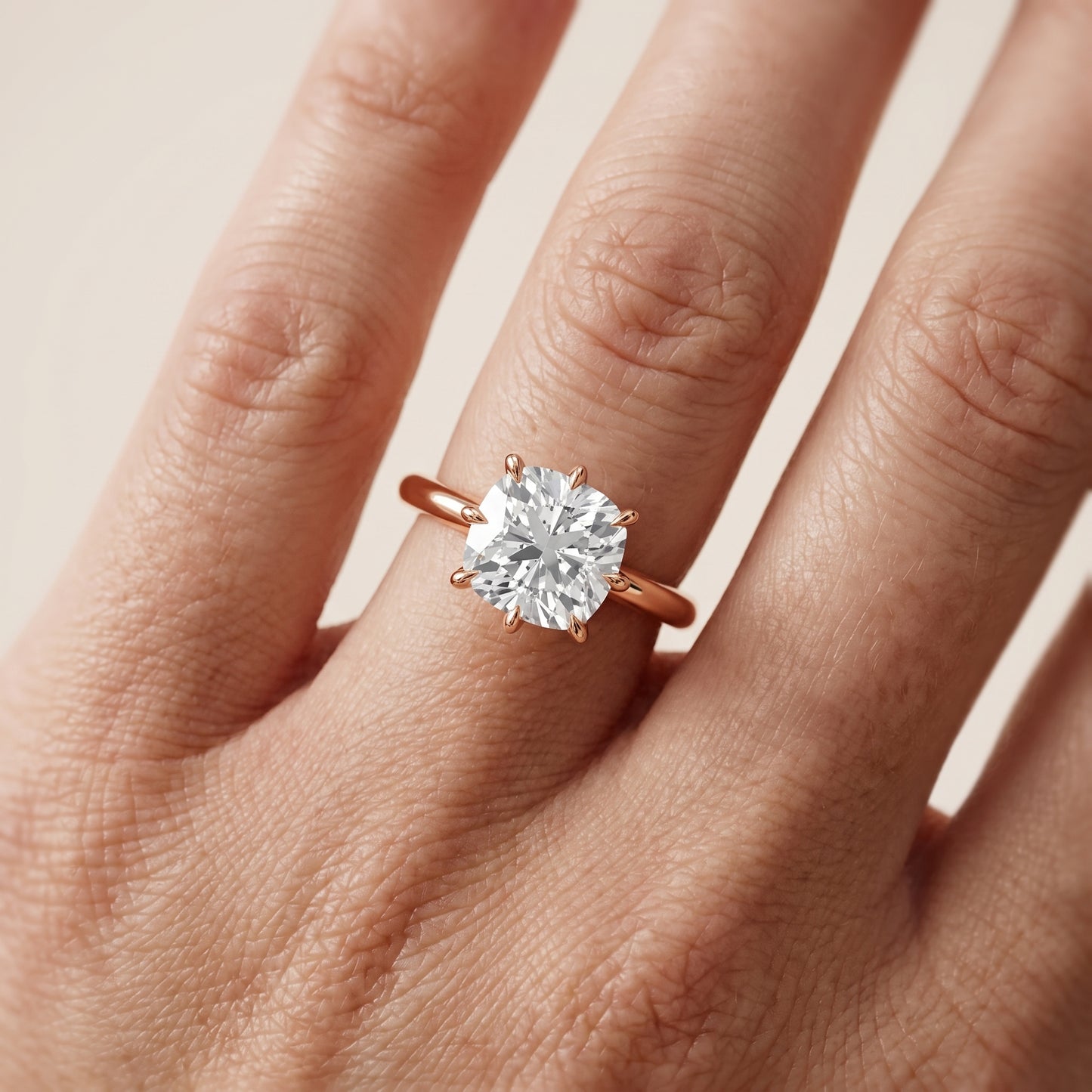 Evie Solitaire Six-Prong Cushion Diamond Engagement Ring in Rose Gold - lifestyle.jpg