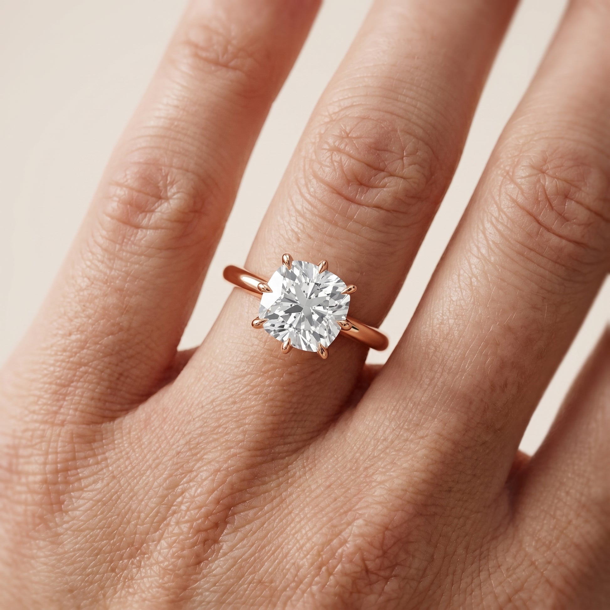 Evie Solitaire Six-Prong Cushion Diamond Engagement Ring in Rose Gold - lifestyle.jpg