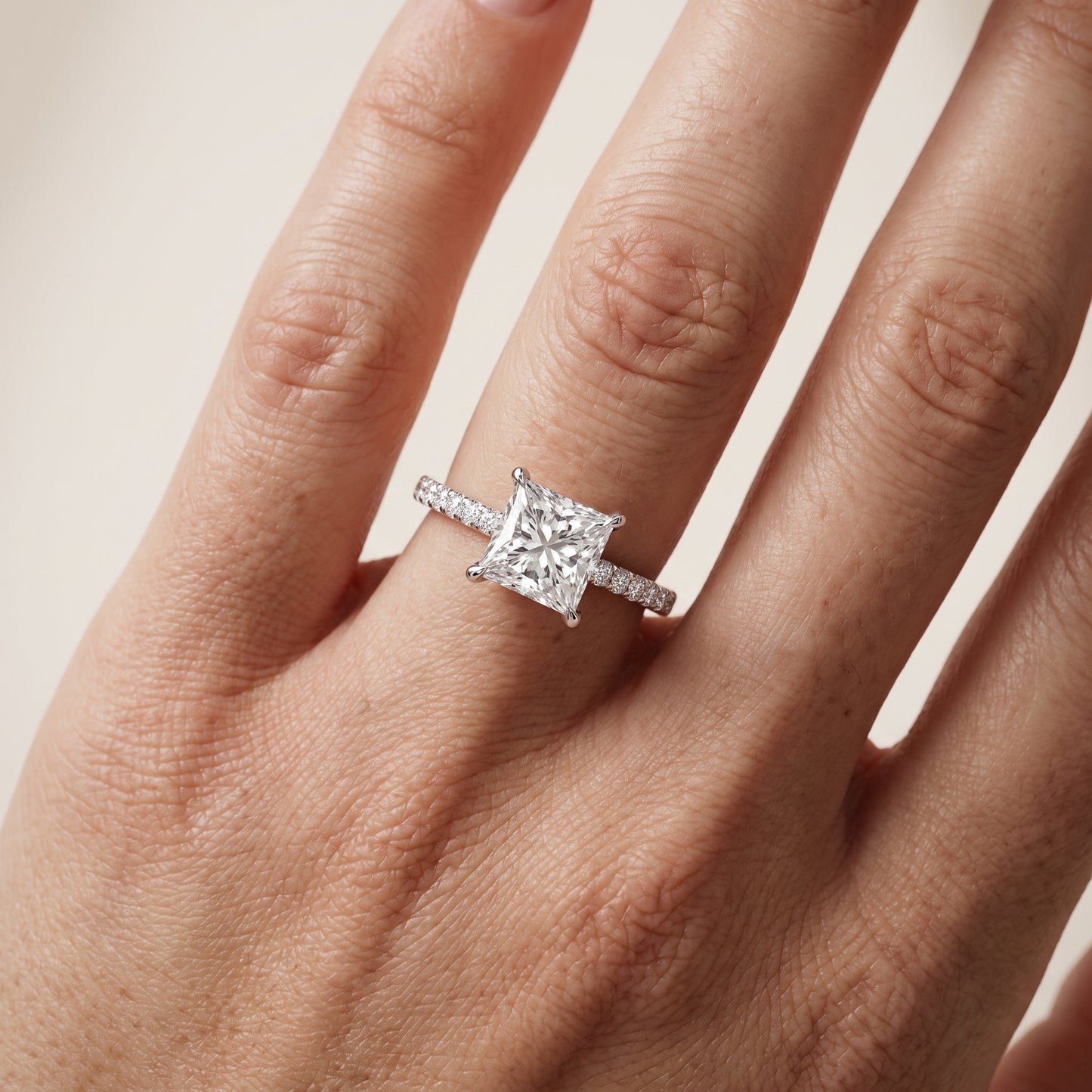 Ione Solitaire Pavé Princess Diamond Engagement Ring in White Gold - lifestyle.jpg