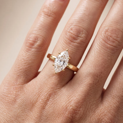Delia Solitaire Marquise Diamond Engagement Ring in Yellow Gold - lifestyle.jpg