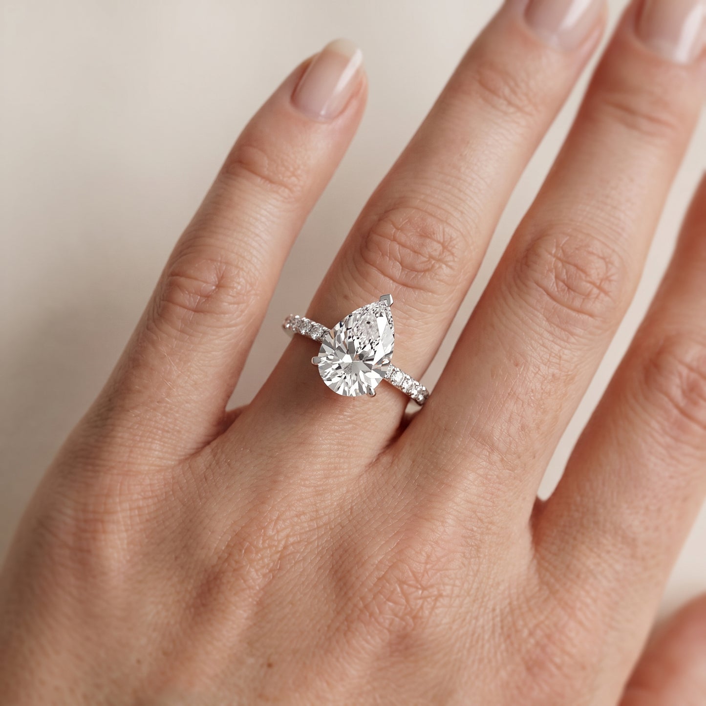 Juna French Pavé Solitaire Pear Diamond Engagement Ring in White Gold - lifestyle.jpg