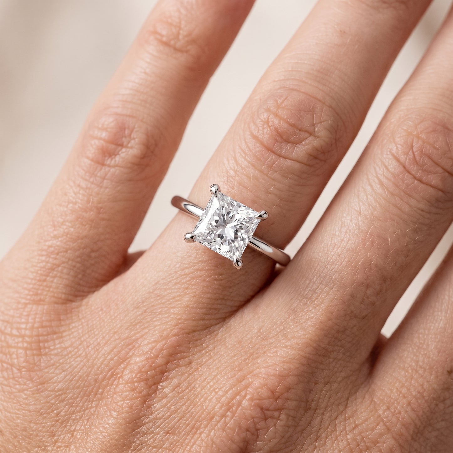 Nella Petite Solitaire Princess Diamond Engagement Ring in White Gold - lifestyle.jpg