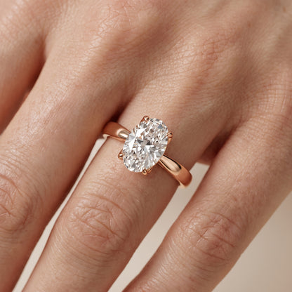 Lucia Solitaire Six-Prong Oval Diamond Engagement Ring in Rose Gold - lifestyle.jpg