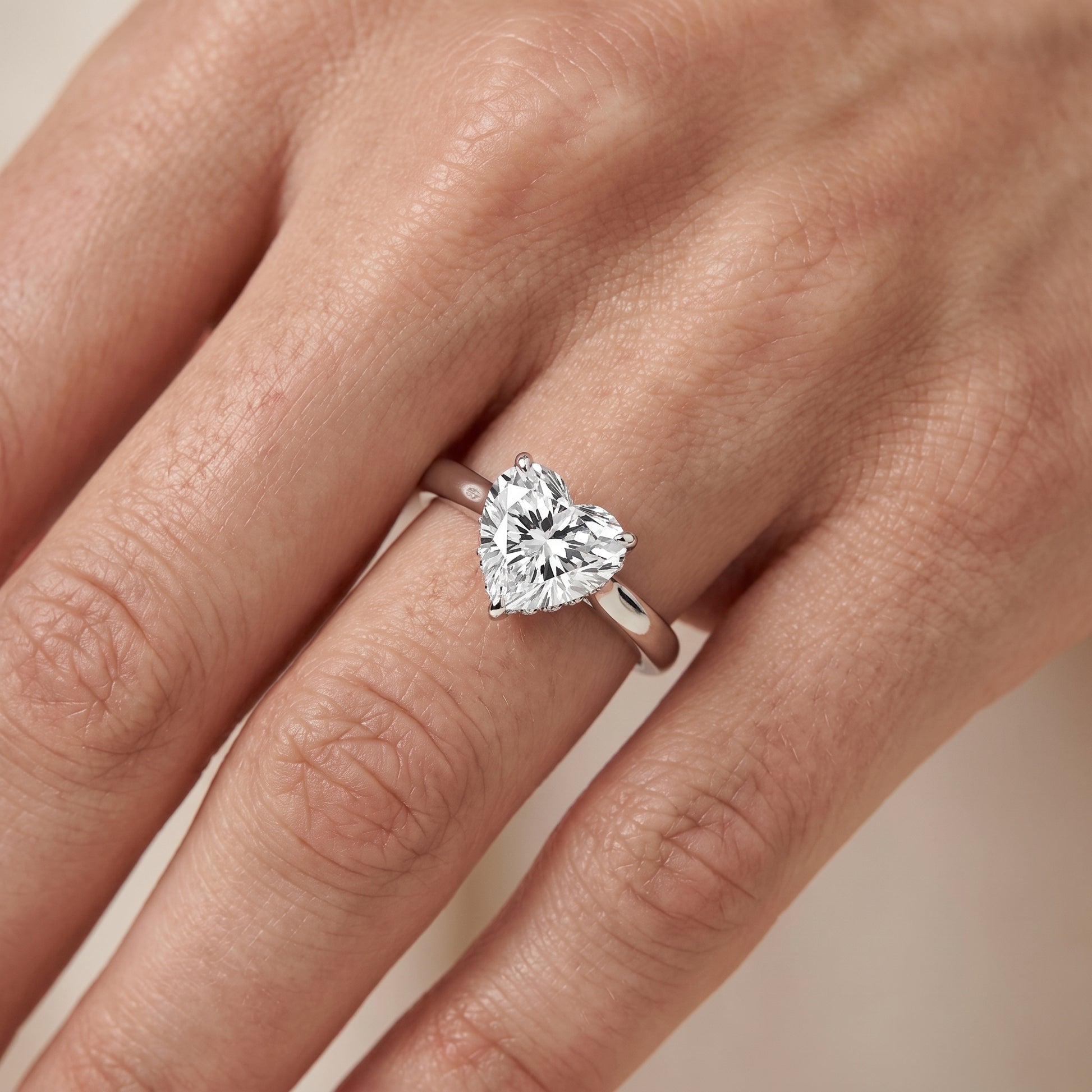 Mena Hidden Halo Heart Diamond Engagement Ring in Platinum - lifestyle.jpg