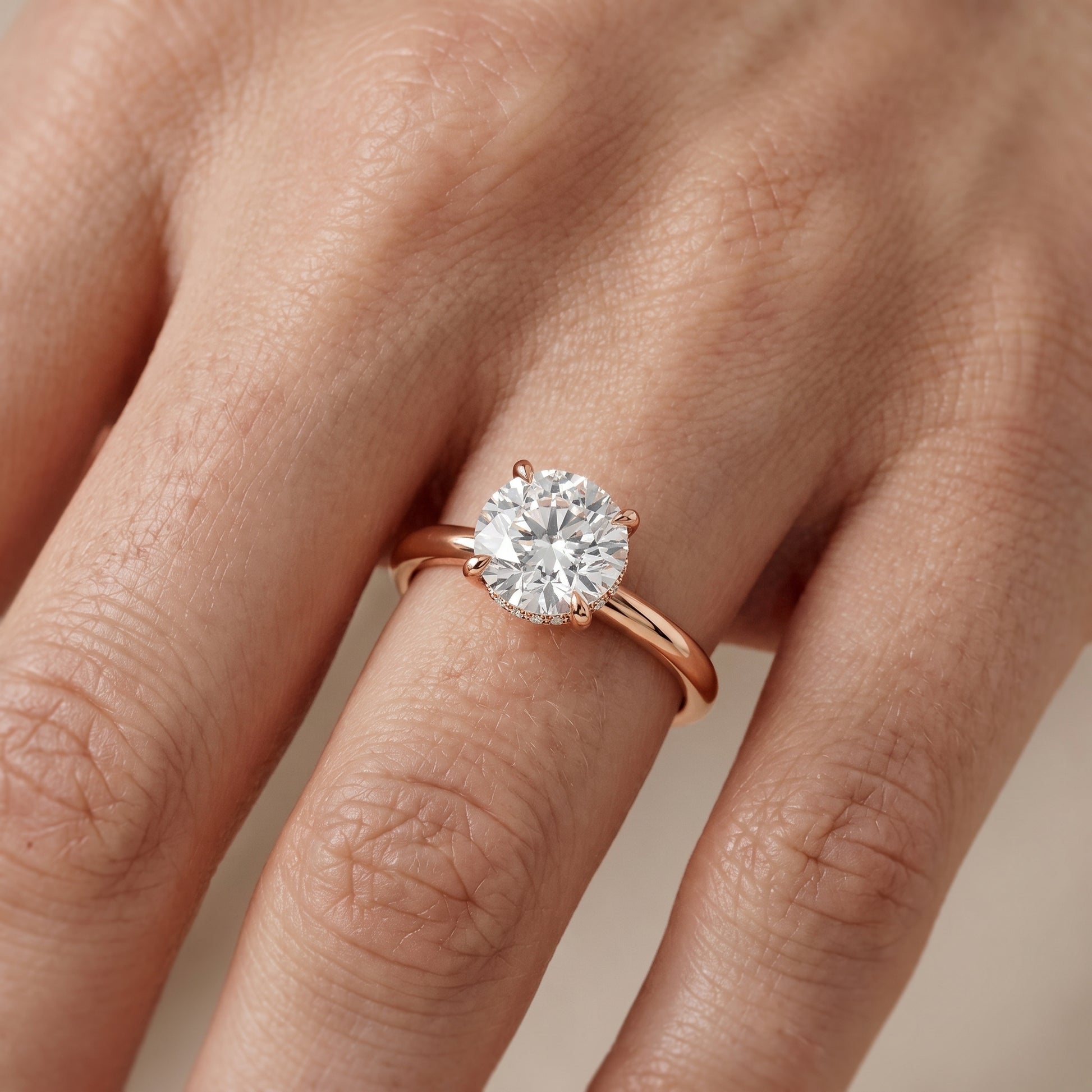 Amaya Hidden Halo Round Diamond Ring in Rose Gold - lifestyle.jpg