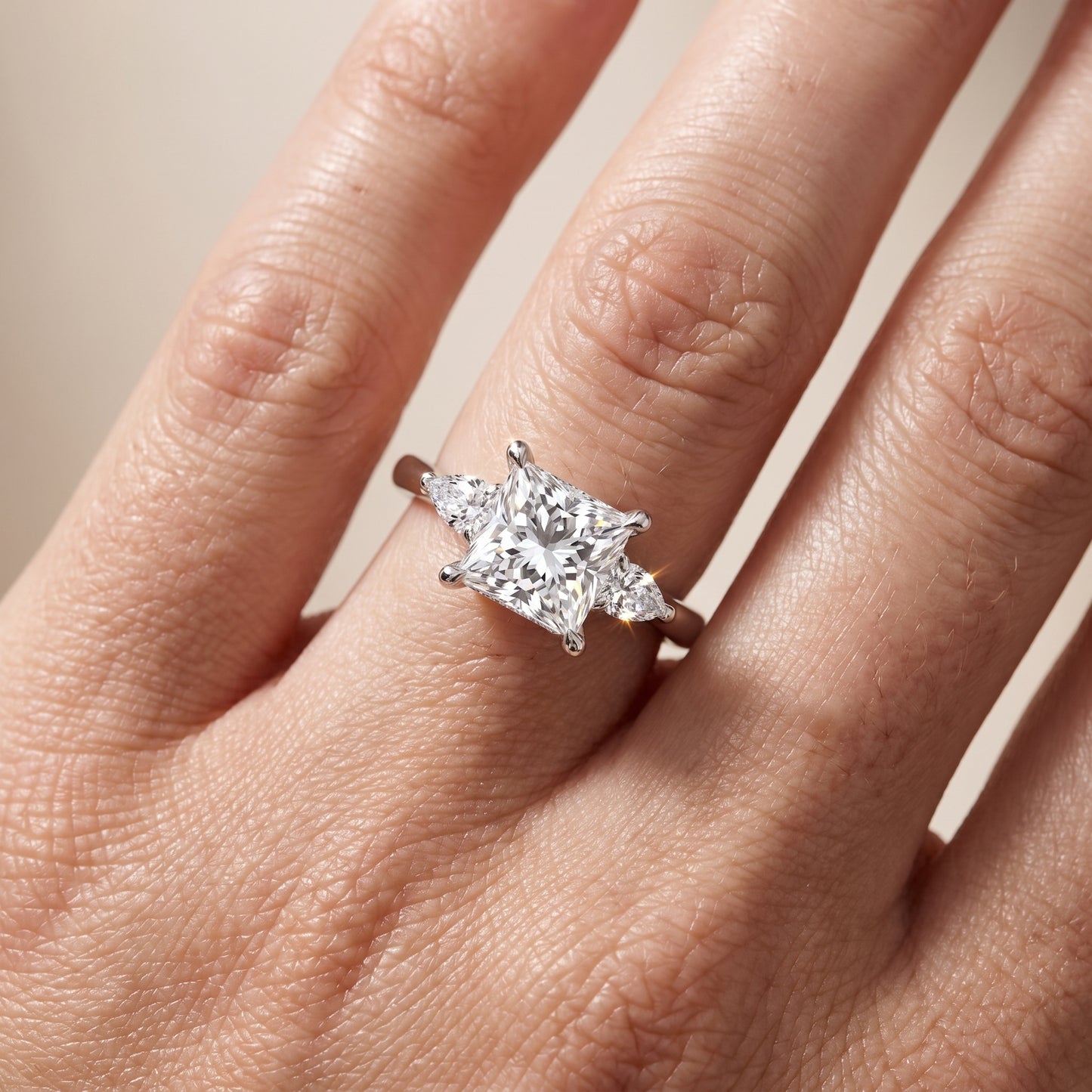 Leila Three-Stone Princess Diamond Engagement Ring in Platinum - lifestyle.jpg