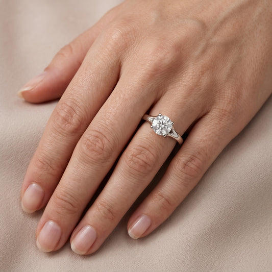 Nell Split Shank Solitaire Round Diamond Engagement Ring in Platinum - lifestyle.jpg