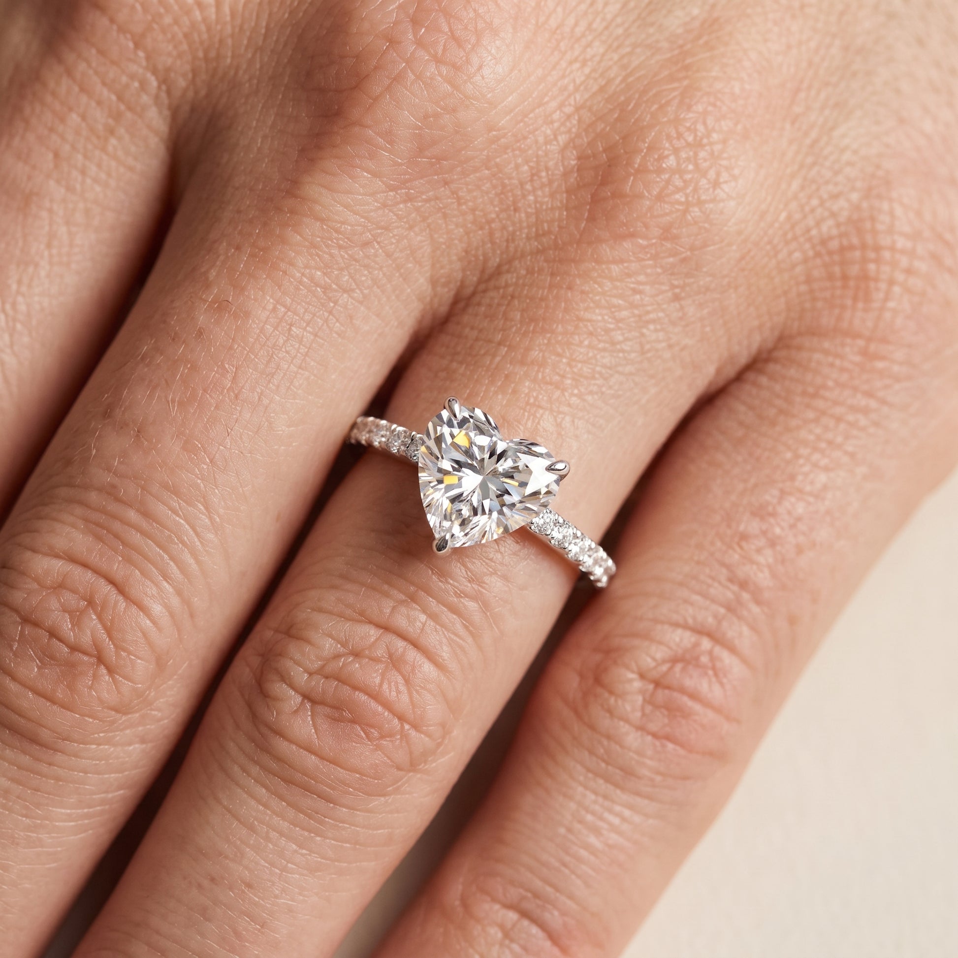 Ione Solitaire Pavé Heart Diamond Engagement Ring in Silver - lifestyle.jpg