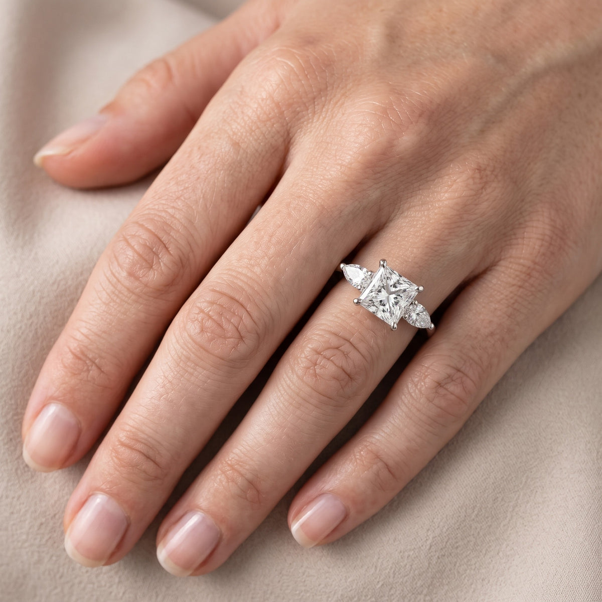 Grace Three Stone Princess Diamond Engagement Ring in White Gold - lifestyle.jpg
