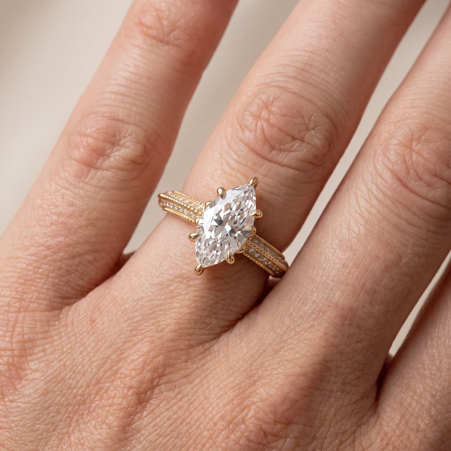 Indie Vintage Milgrain Marquise Diamond Engagement Ring in Yellow Gold - lifestyle.jpg