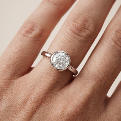 Jolie Bezel Solitaire Round Diamond Engagement Ring in Platinum - lifestyle.jpg