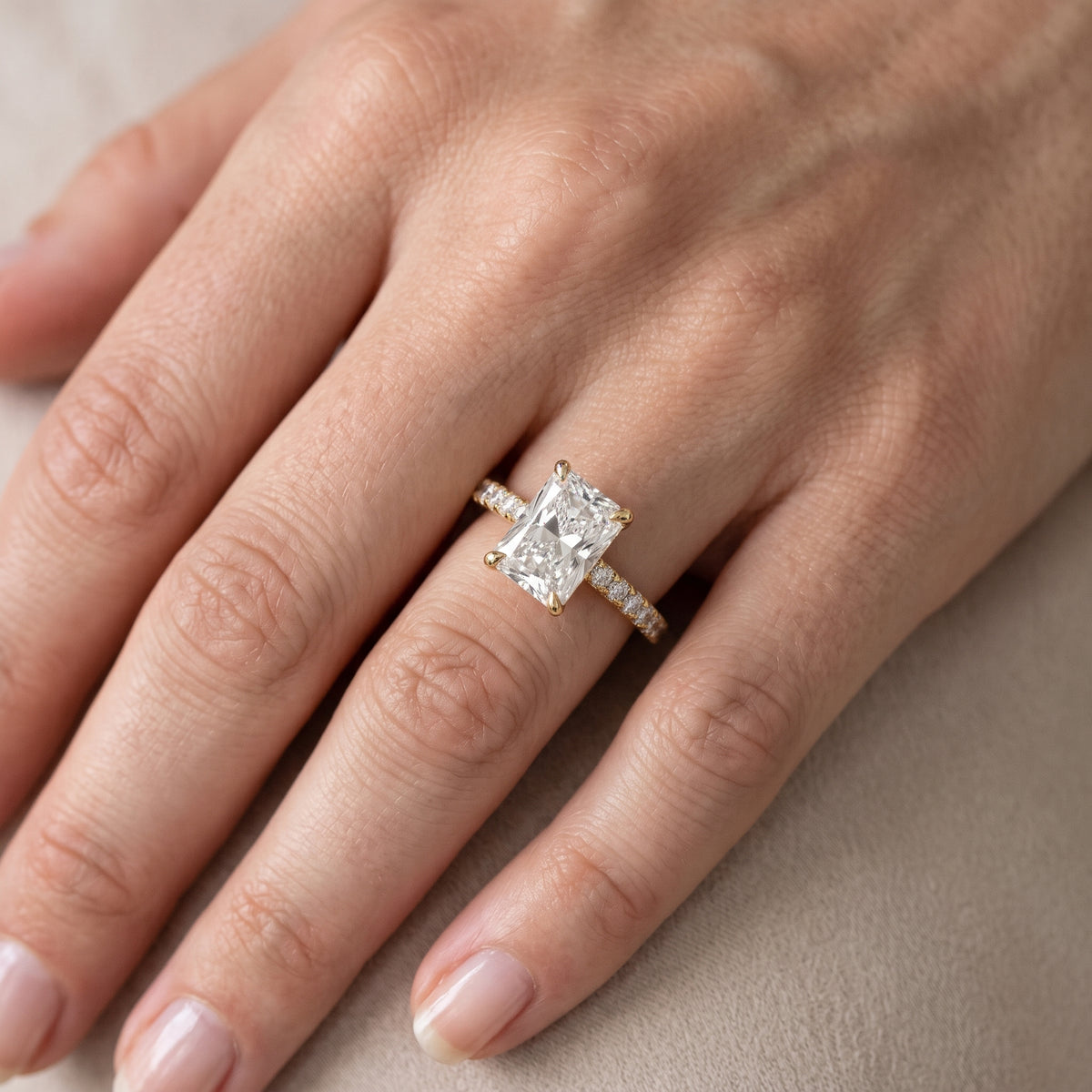 Maya Hidden Halo Pavé Radiant Diamond Engagement Ring in Yellow Gold - lifestyle.jpg