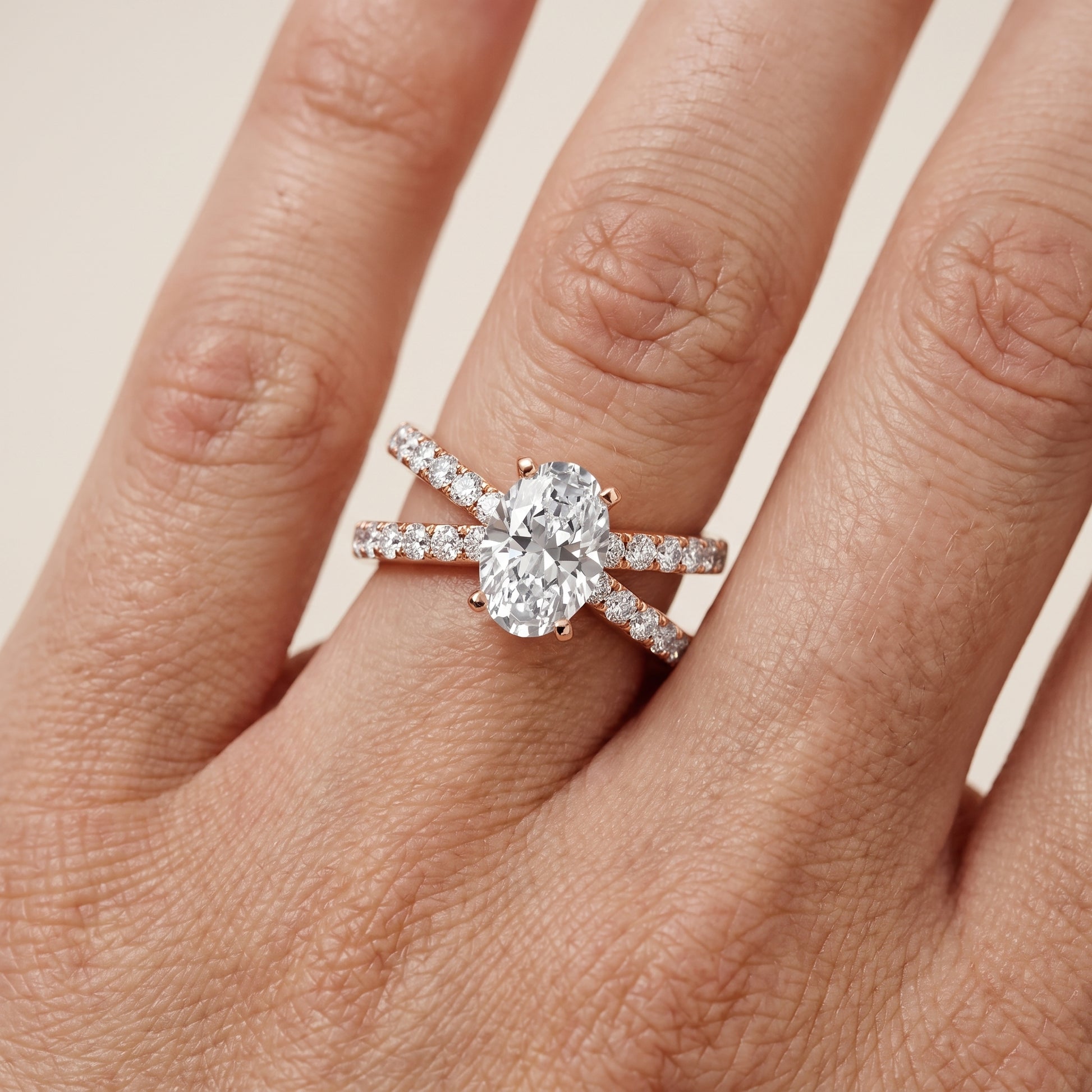 Lior Criss Cross Pavé Oval Diamond Engagement Ring in Rose Gold - lifestyle.jpg