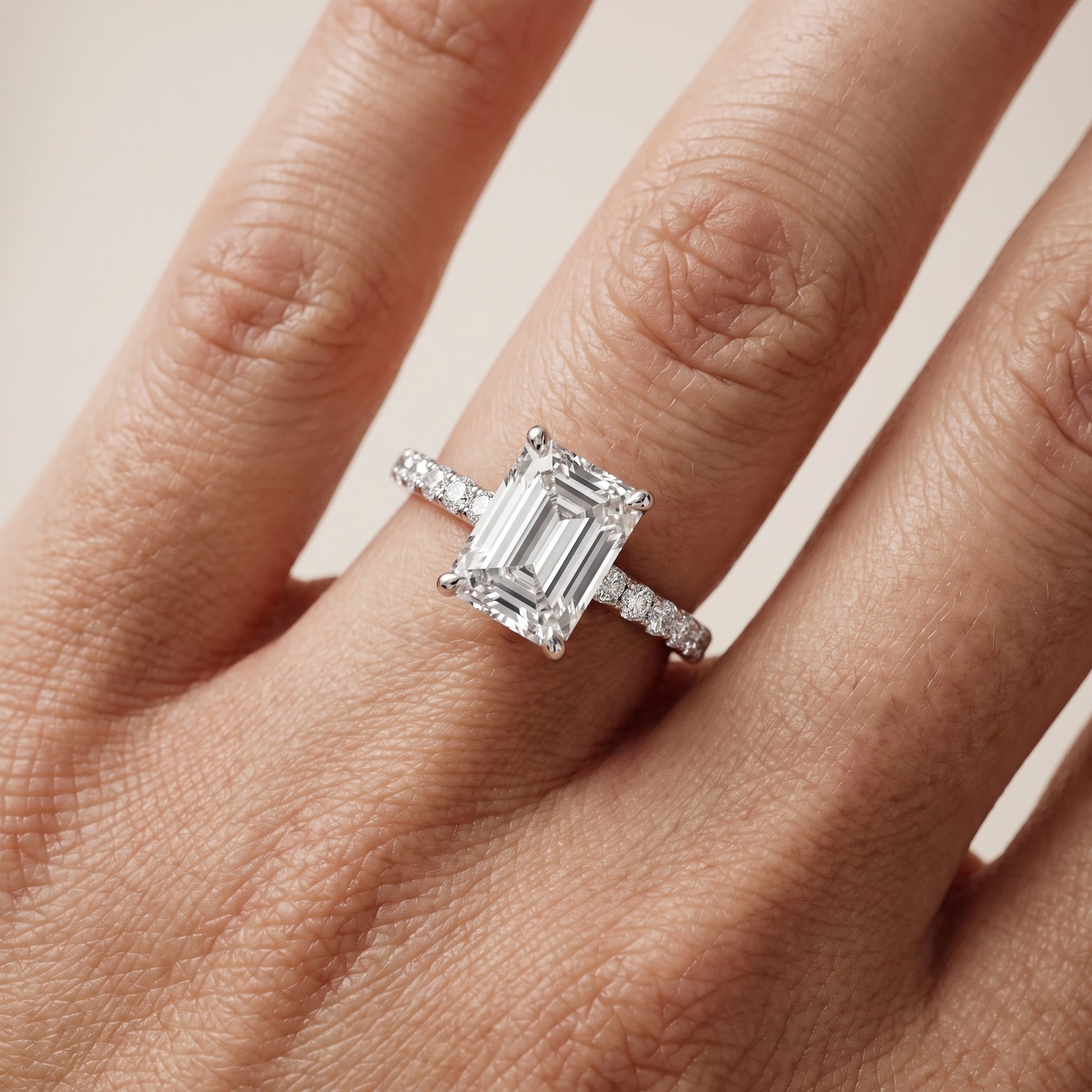 Thea Hidden Halo Pavé Emerald Diamond Engagement Ring in Platinum - lifestyle.jpg
