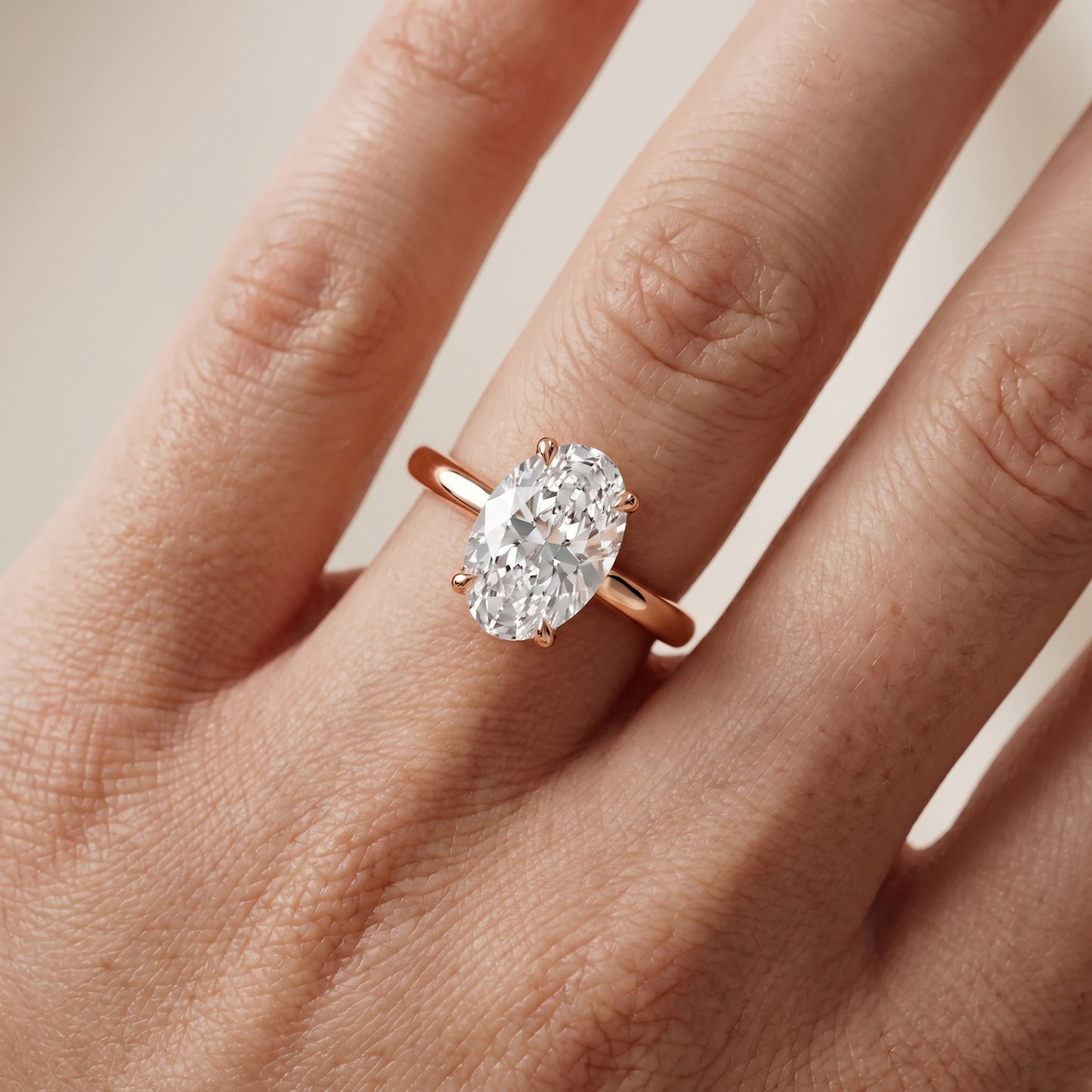 Mena Hidden Halo Oval Diamond Engagement Ring in Rose Gold - lifestyle.jpg