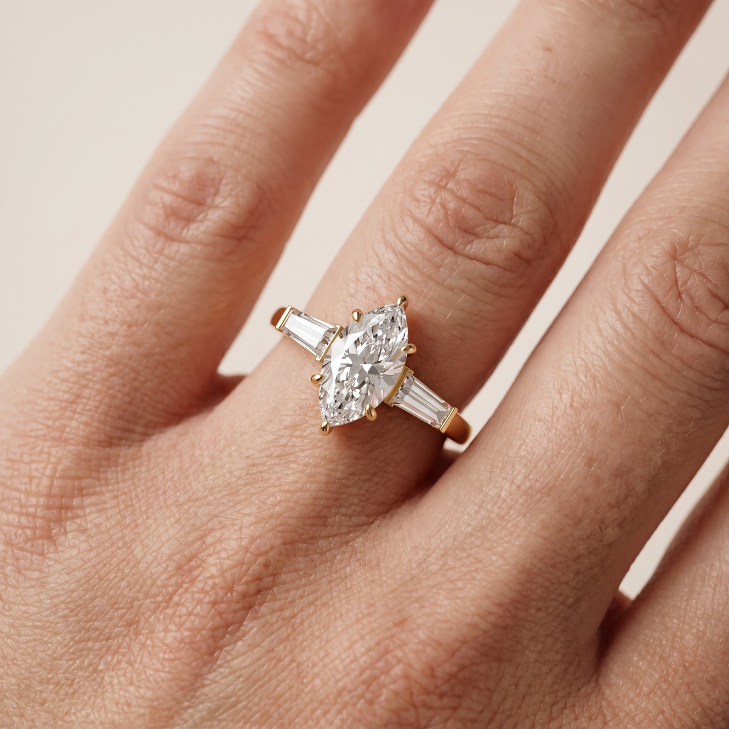 Zelda Tapered Baguette Marquise Diamond Engagement Ring in Yellow Gold - lifestyle.jpg
