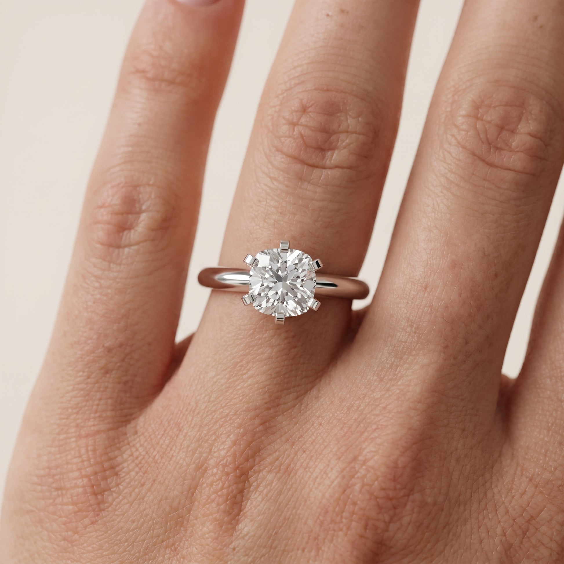 Amira Six-Prong Solitaire Cushion Diamond Engagement Ring in Silver - lifestyle.jpg