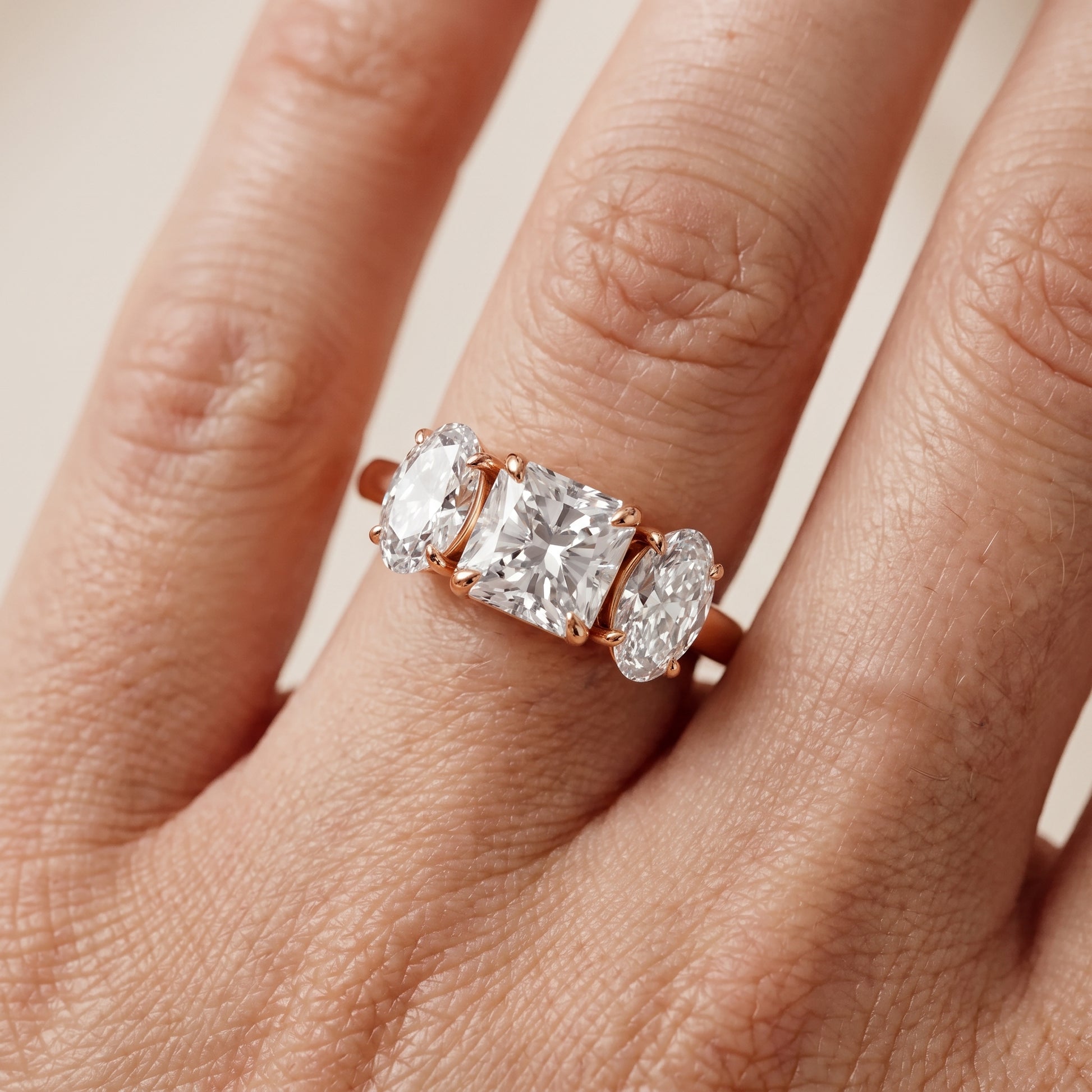 Lila Three-Stone Radiant Diamond Ring in Rose Gold - lifestyle.jpg