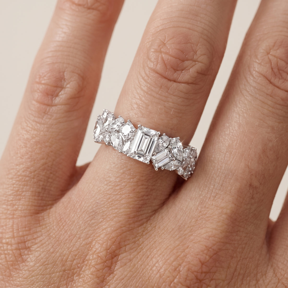 Louisa Cluster Emerald & Pear Diamond Anniversary Ring in Platinum - lifestyle.jpg