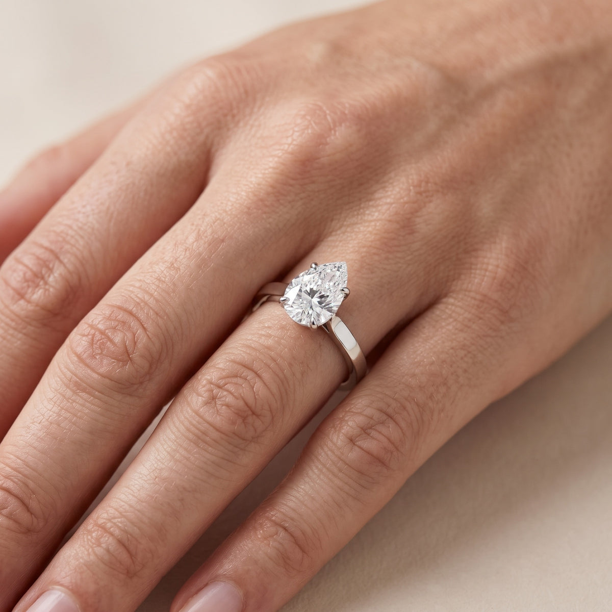 Isabella Bloom Solitaire Pear Diamond Engagement Ring in White Gold - lifestyle.jpg