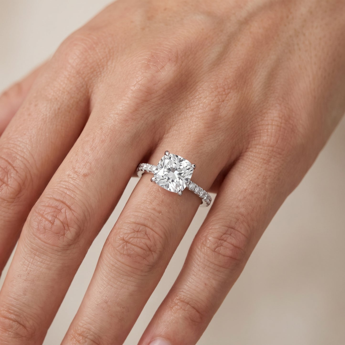 Ione Solitaire Pavé Cushion Diamond Engagement Ring in White Gold - lifestyle.jpg