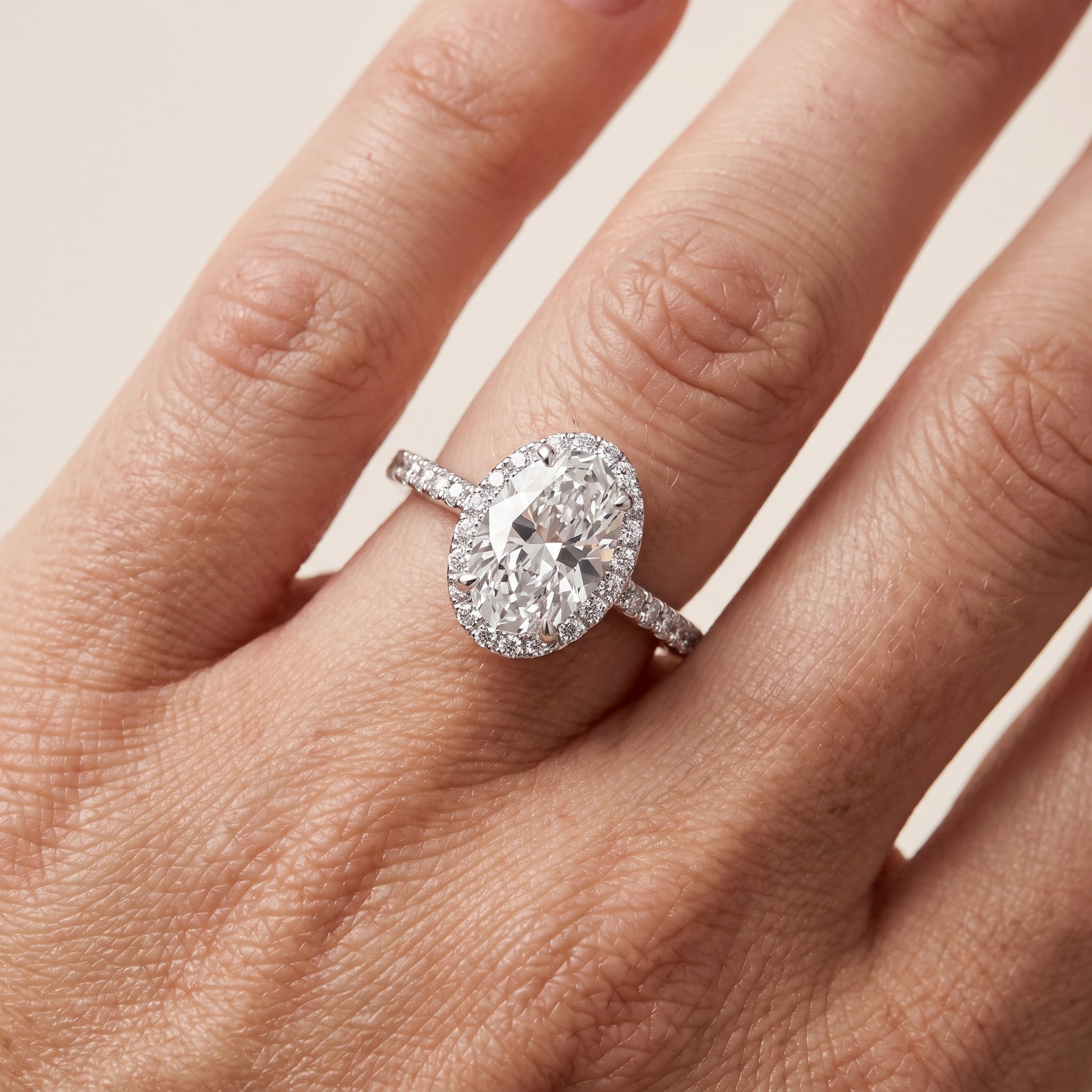 Alma Halo Pavé Oval Diamond Ring in Platinum - lifestyle.jpg