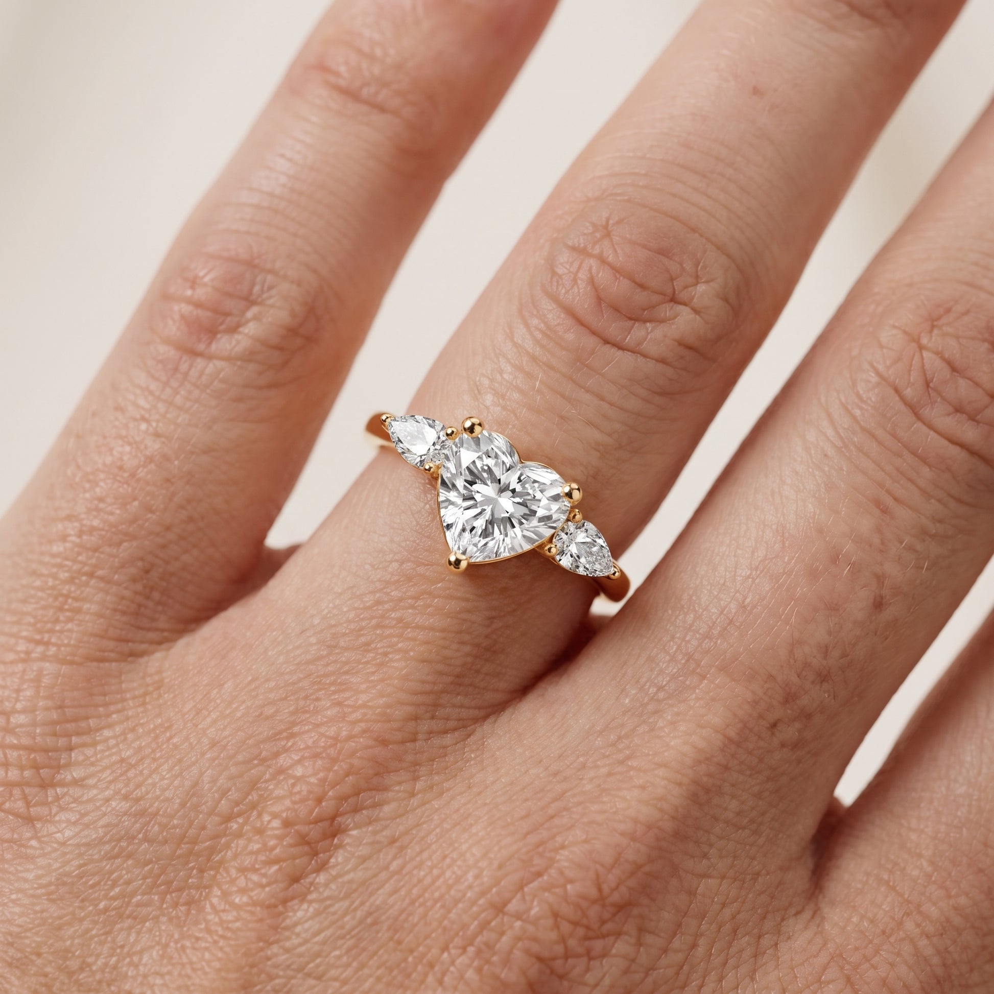 Faye Three-Stone Trellis Heart Diamond Ring in Yellow Gold - lifestyle.jpg