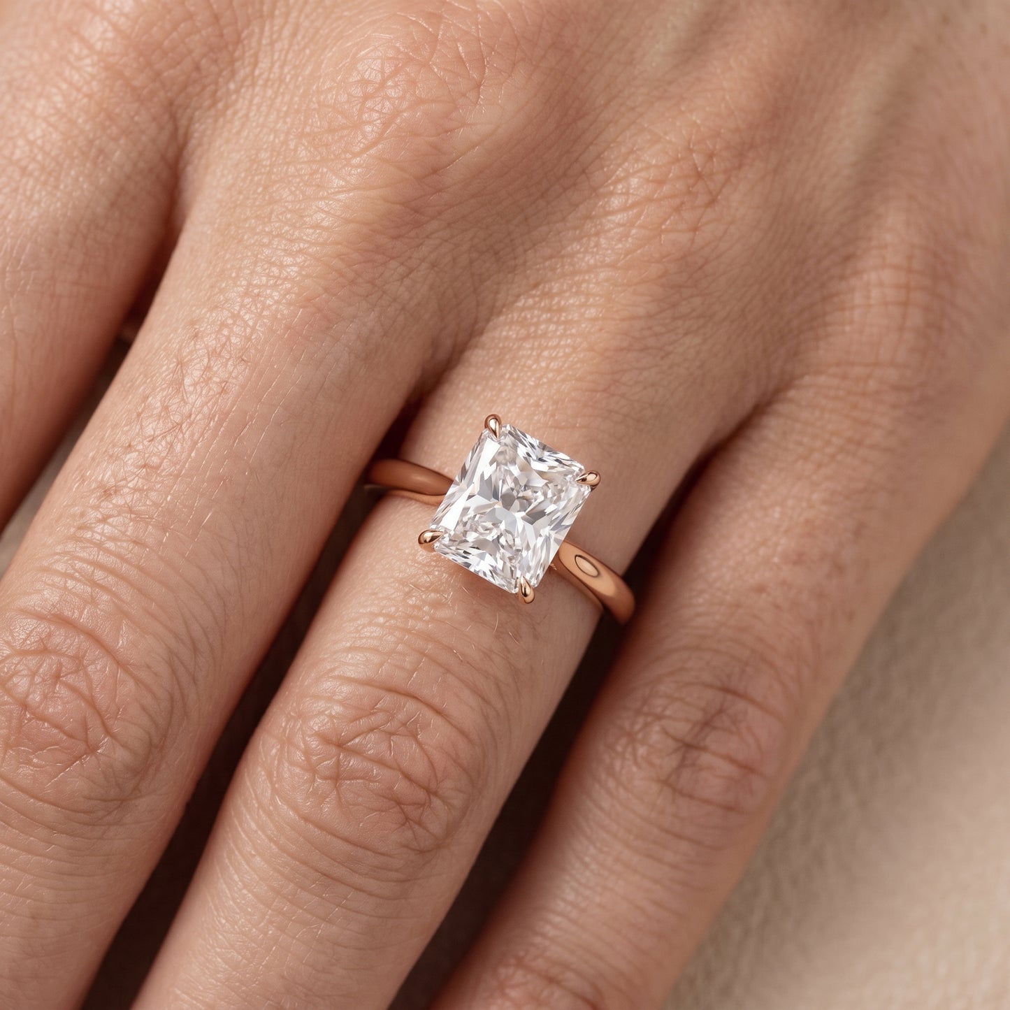 Evie Solitaire Six-Prong Radiant Diamond Engagement Ring in Rose Gold - lifestyle.jpg