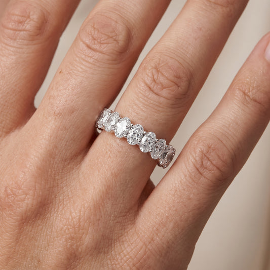 Vidya Shared Prong Oval Diamond Eternity Band in White Gold - lifestyle.jpg