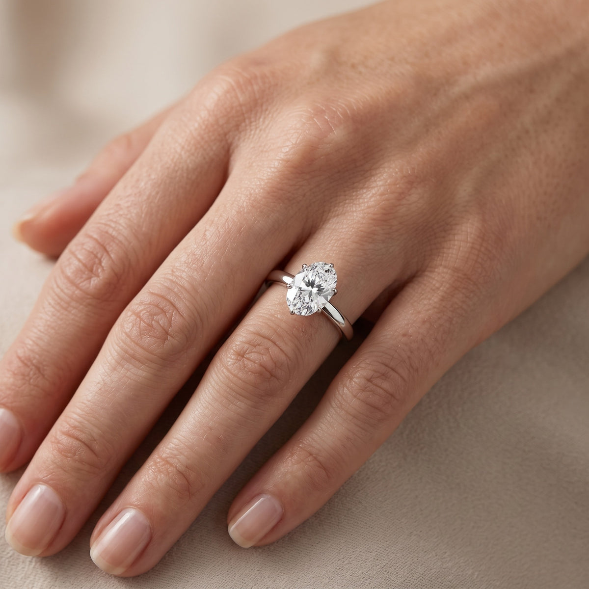 Serena Blossom Solitaire Oval Diamond Engagement Ring in White Gold - lifestyle.jpg