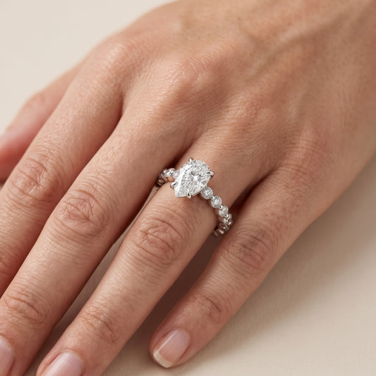 Piper Sidestone Pear Diamond Engagement Ring in Platinum - lifestyle.jpg