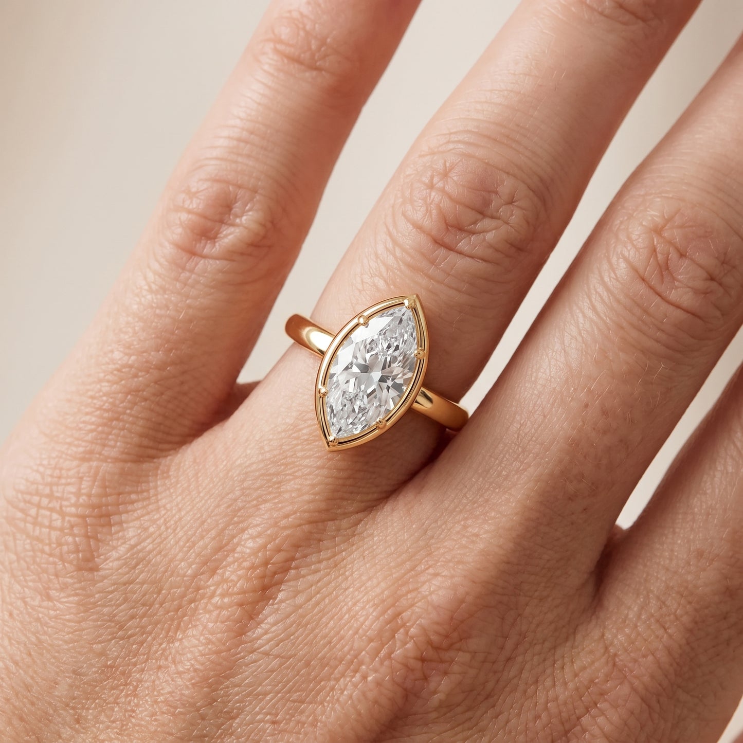 Alina Bezel Solitaire Marquise Diamond Ring in Yellow Gold - lifestyle.jpg