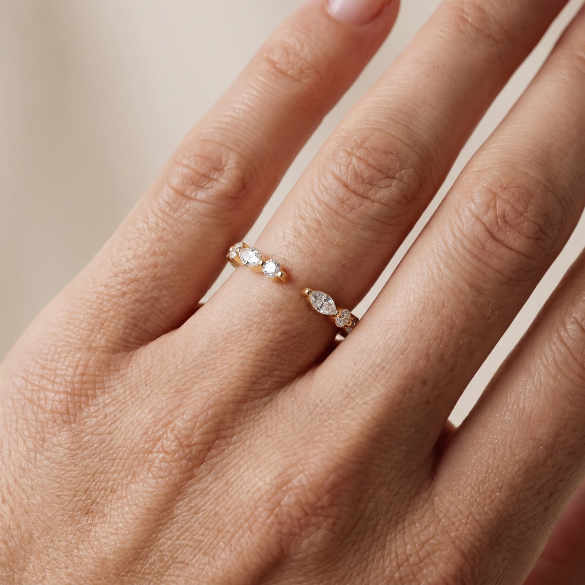 Hollis Shared Prong Round & Marquise Diamond Wedding Band in Yellow Gold - lifestyle.jpg