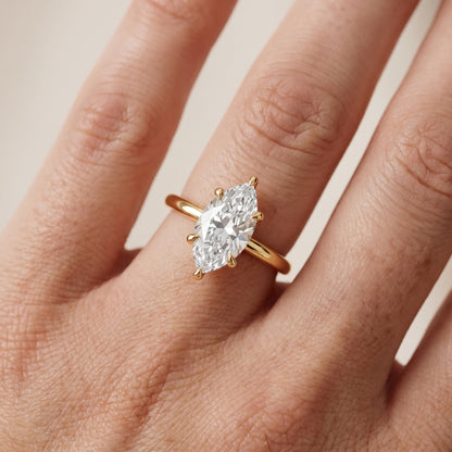 Nella Petite Solitaire Marquise Diamond Engagement Ring in Yellow Gold - lifestyle.jpg