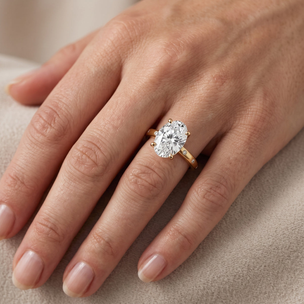 Dulcie Flush-Set Oval Diamond Engagement Ring in Platinum - lifestyle.jpg
