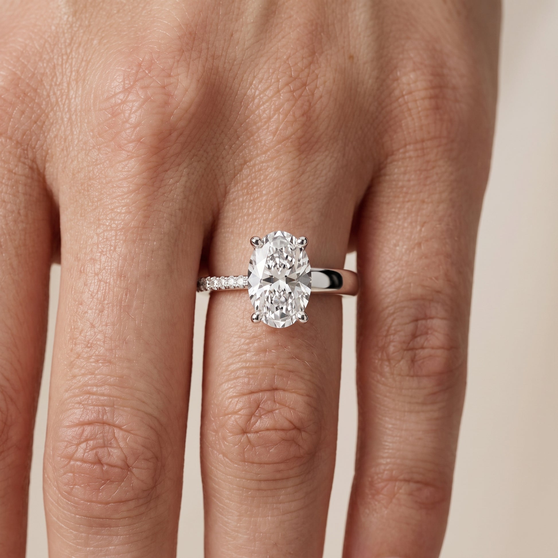 Rosie Solitaire Basket Oval Diamond Engagement Ring in Silver - lifestyle.jpg