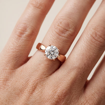 Talia Solitaire Twist Round Diamond Engagement Ring in Rose Gold - lifestyle.jpg
