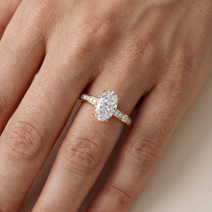 Maren Sidestone Channel Set Oval Diamond Engagement Ring in Yellow Gold - lifestyle.jpg