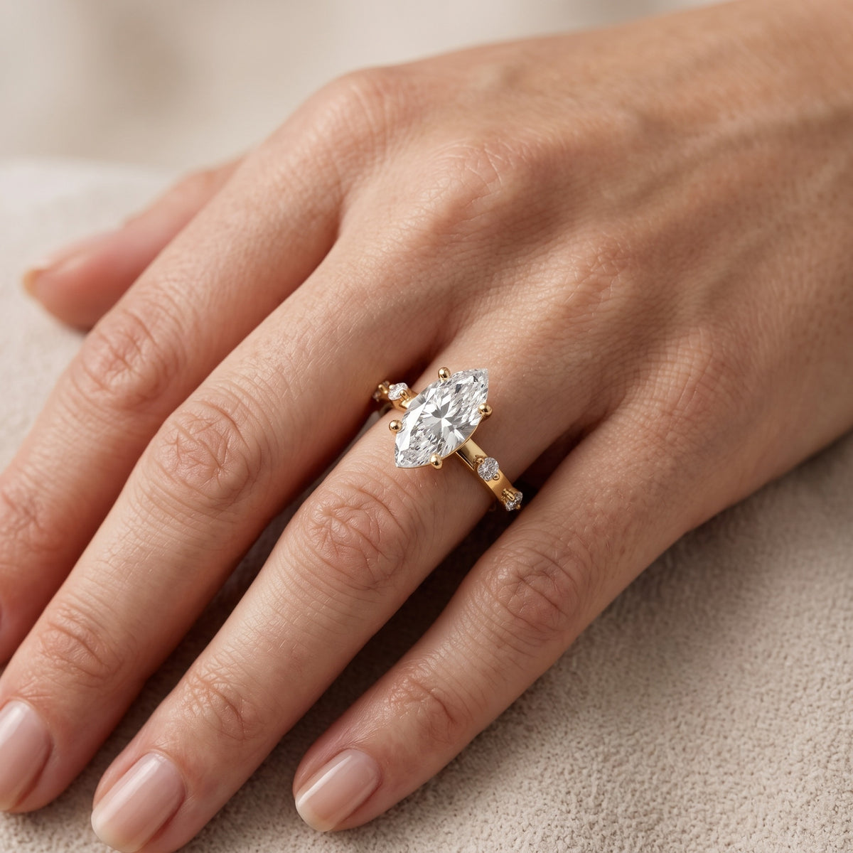 Elena Radiance Solitaire Marquise Diamond Engagement Ring in Yellow Gold - lifestyle.jpg