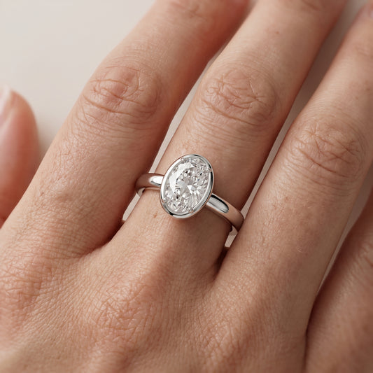 Alina Bezel Solitaire Oval Diamond Ring in White Gold - lifestyle.jpg