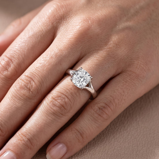 Nell Split Shank Solitaire Cushion Diamond Engagement Ring in Platinum - lifestyle.jpg