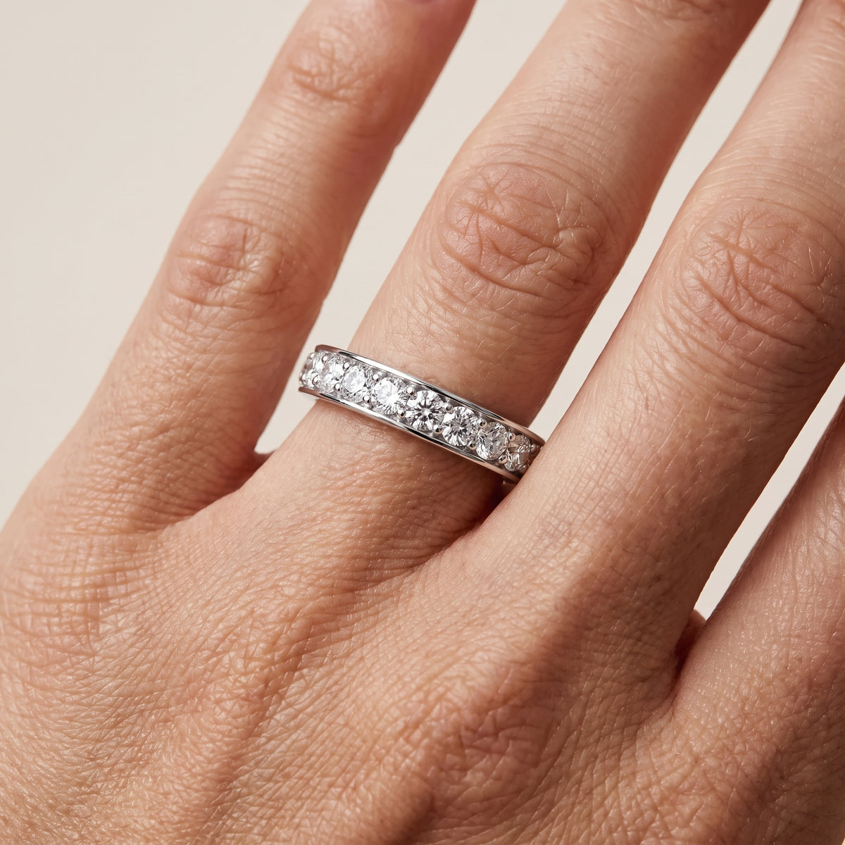 Belen Channel Set Round Diamond Eternity Band in Platinum - lifestyle.jpg