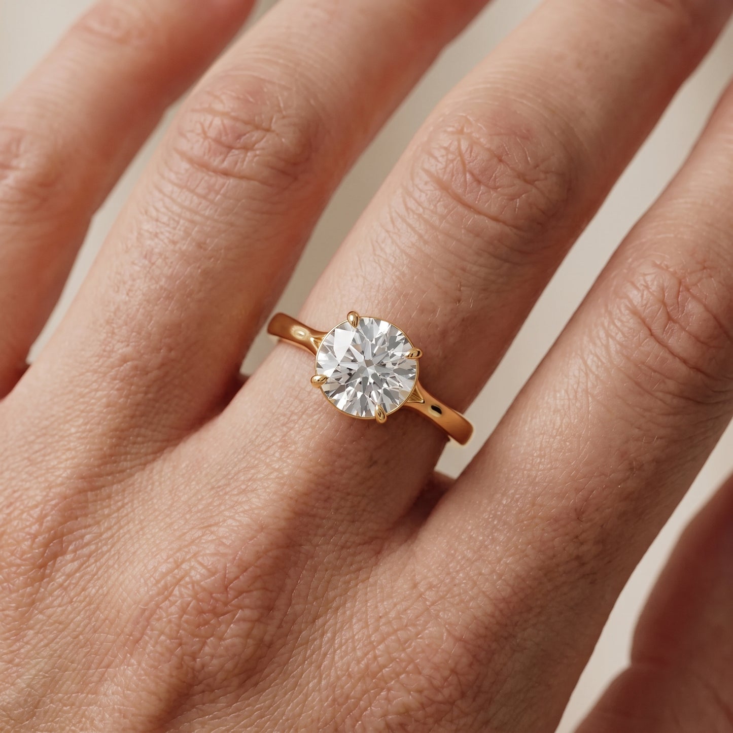 Anais Trellis Solitaire Round Diamond Engagement Ring in Yellow Gold - lifestyle.jpg