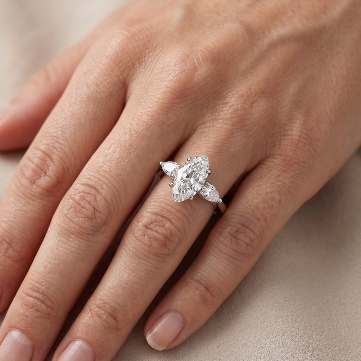 Grace Three Stone Marquise Diamond Engagement Ring in Silver - lifestyle.jpg
