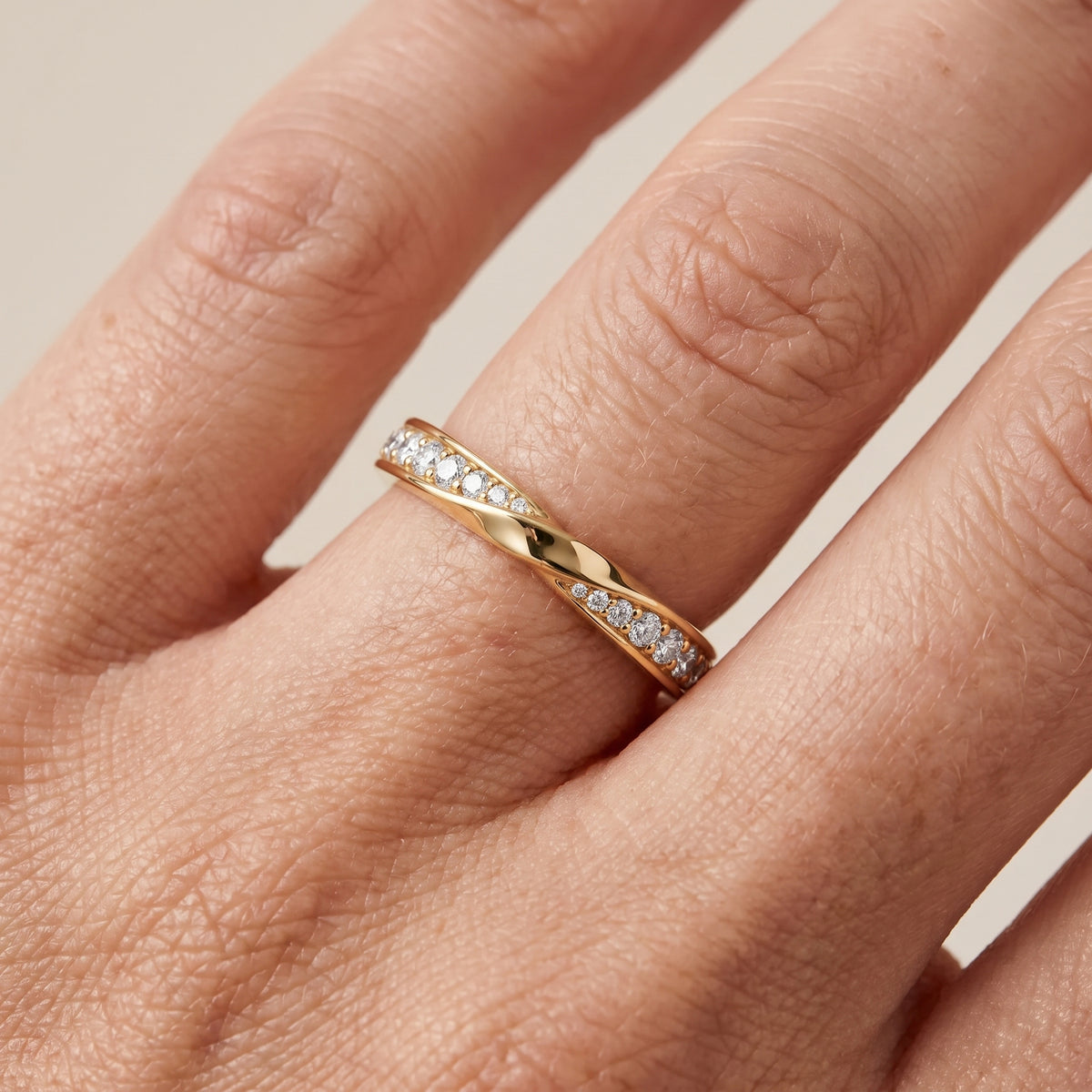 Sutton Twist Pavé Round Diamond Wedding Band in Yellow Gold - lifestyle.jpg