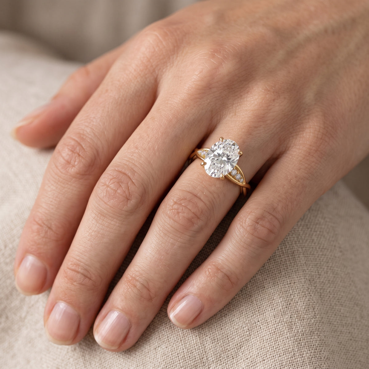 Stefania Twist Oval Diamond Engagement Ring in Yellow Gold - lifestyle.jpg