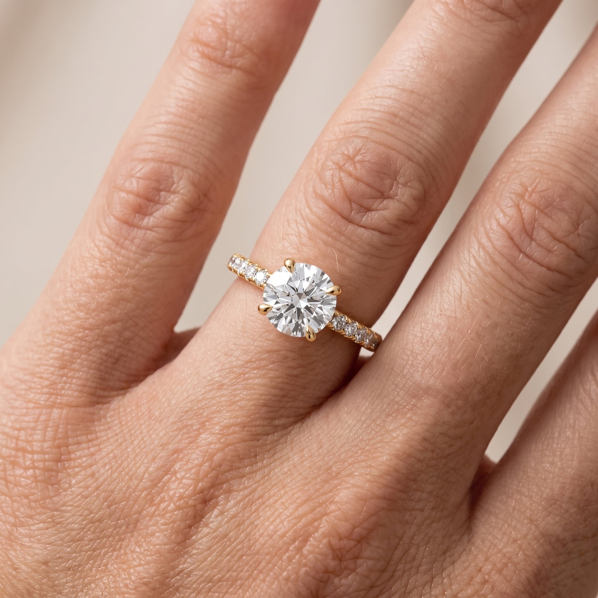 Maya Hidden Halo Pavé Round Diamond Engagement Ring in Yellow Gold - lifestyle.jpg
